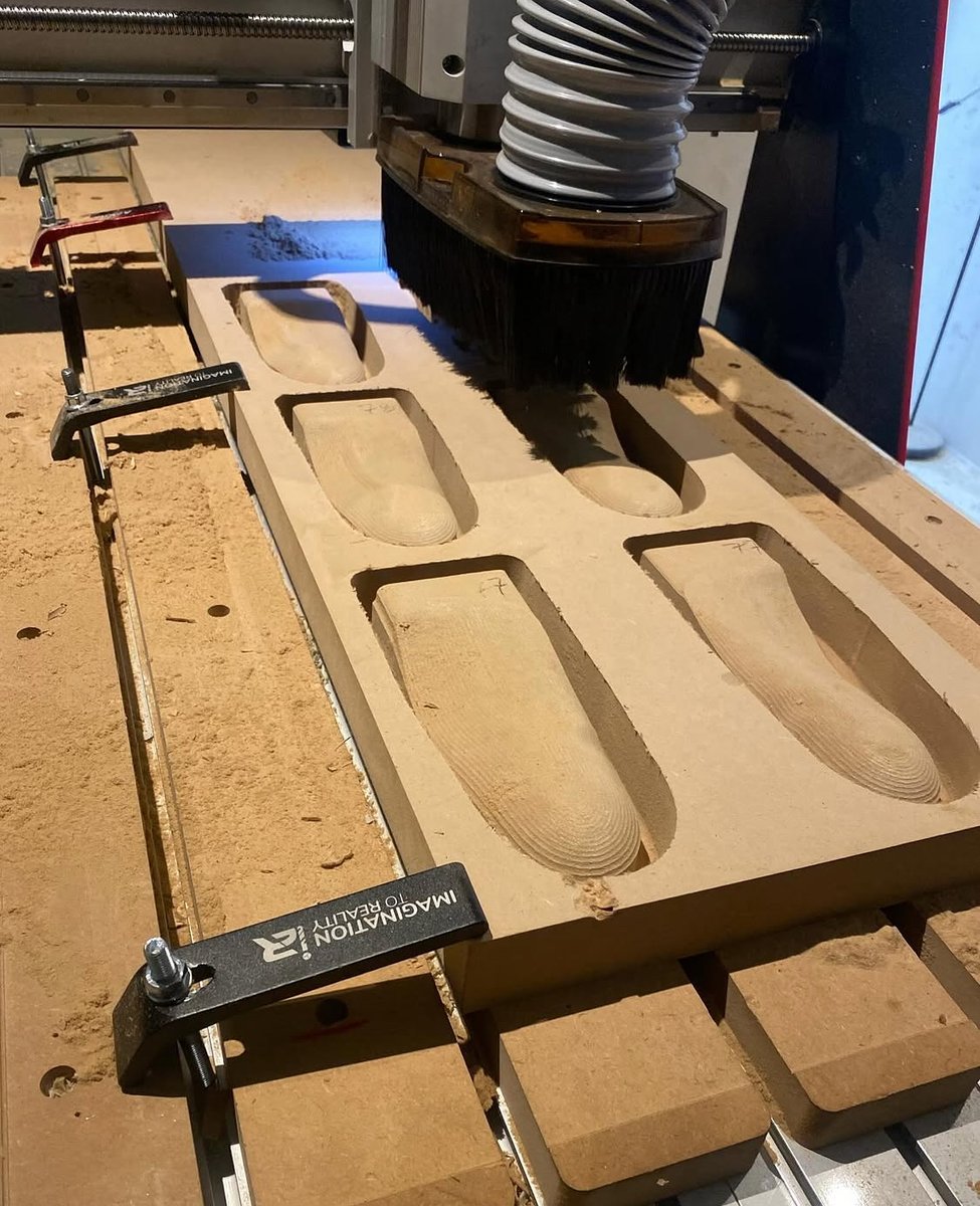 CNC machine milling orthotic positive models in the JSR Devices lab